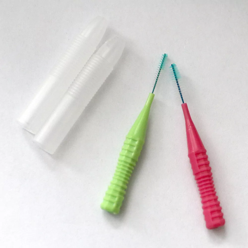 Bærbar interdental børste